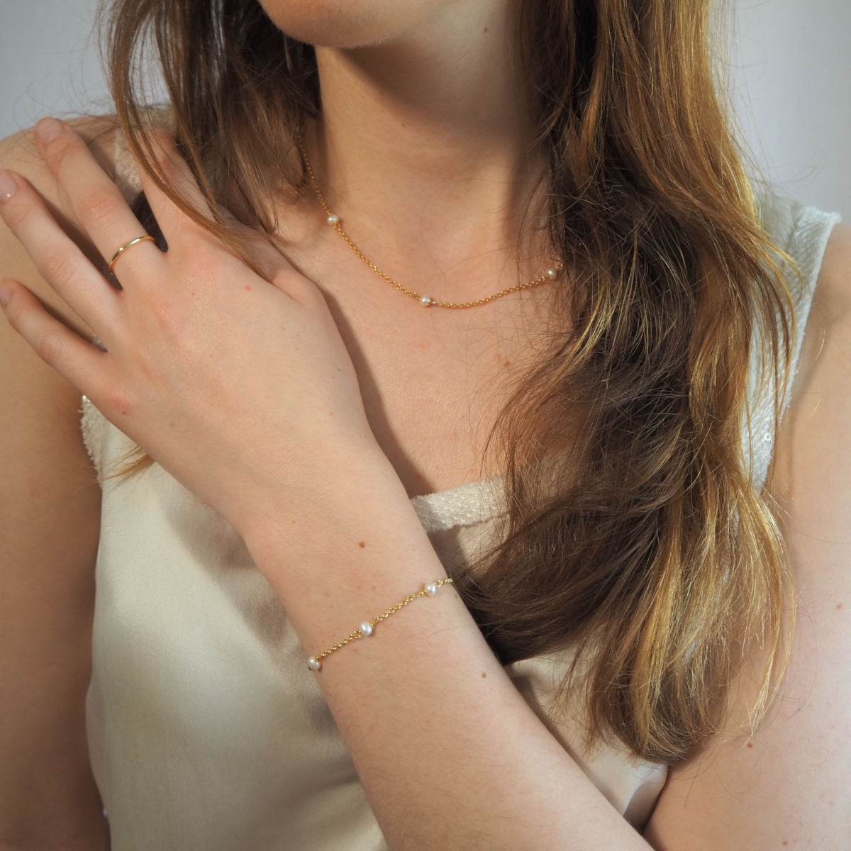 Armband mit fünf Perlen
